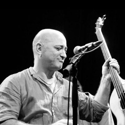 אבי בללי | המהגר